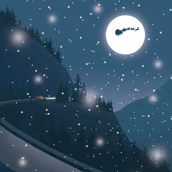 A vehicle drives around a curved road in a Christmas snowstorm while Santa's sleigh flies overhead.