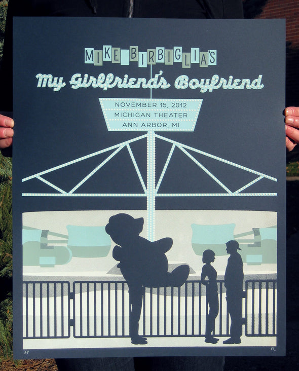 A screen printed gigposter for Mike Birbiglia's 2012 one man show, My Girlfriend's Boyfriend, in Ann Arbor, Michigan. A boy stands ignored in front of The Scrambler at a fair holding a giant teddy bear.