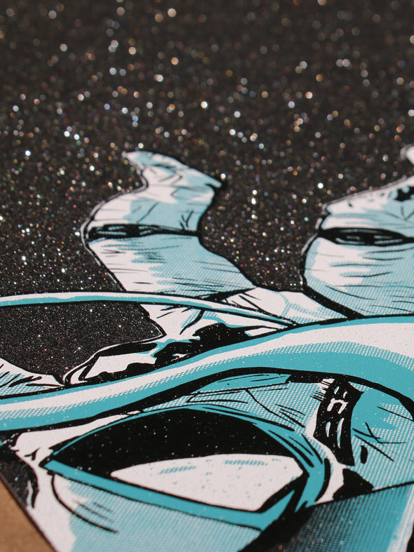 Black glitter paper shines like distant stars on a screen print of astronauts in space.